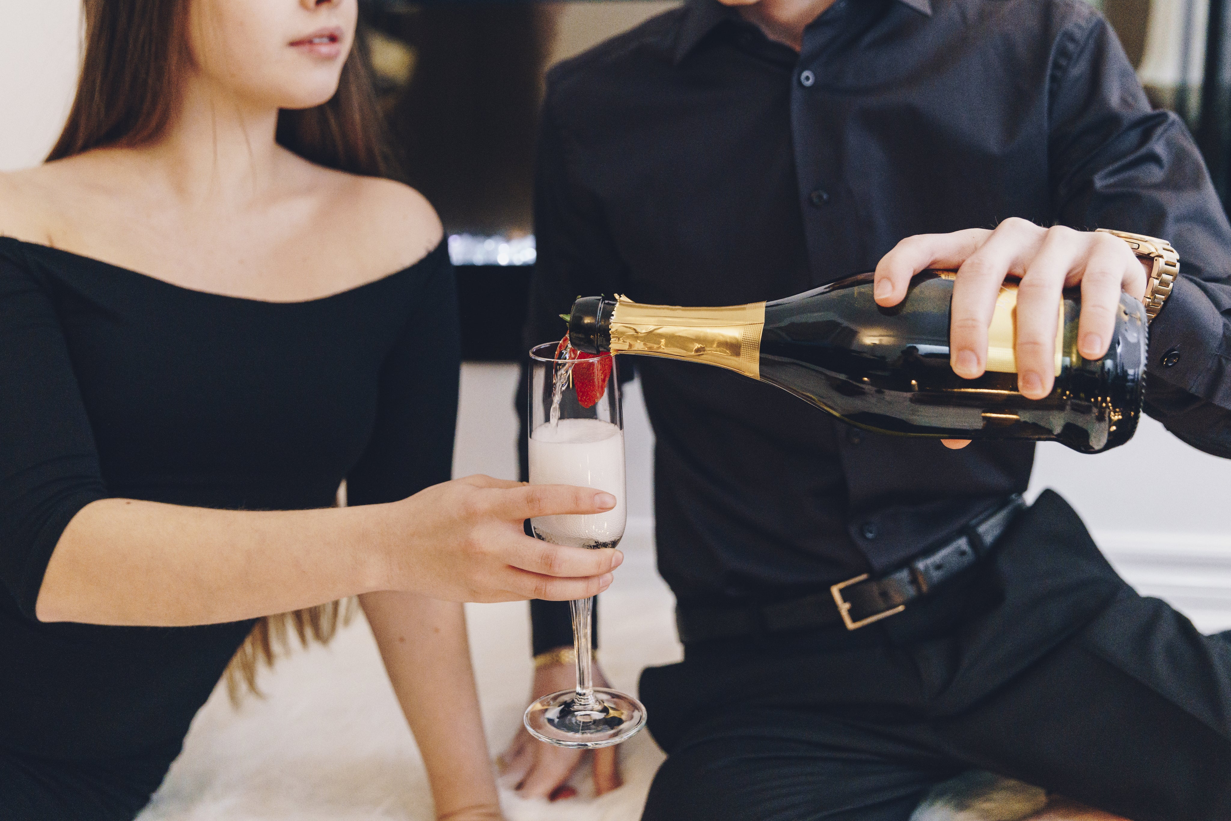 couple-pouring-champagne.jpg